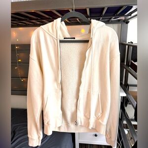 Brandy Melville zip up hoodie in cream color!